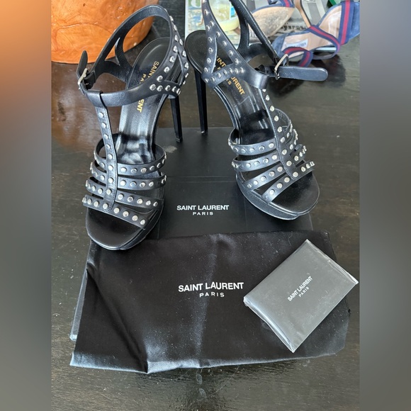 Yves Saint Laurent Black Leather Classic Tribute
Studded T-strap Platforms - Picture 2 of 10